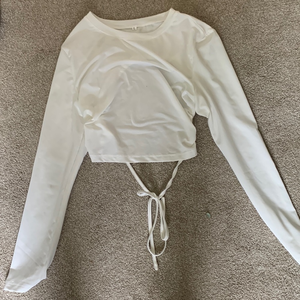 open back, cropped long sleeve. perfect for going out
